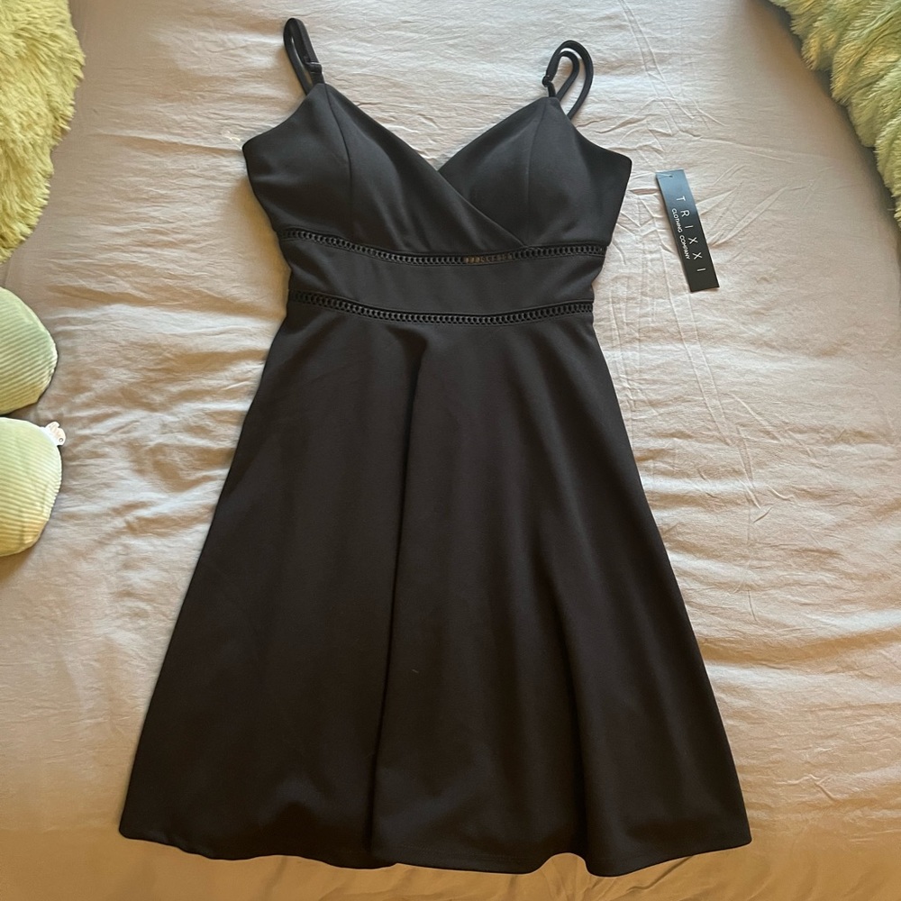 Cute black dress with adjustable straps! NEW WITH TAGS